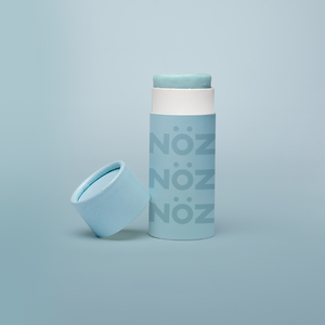 Light Blue Nöz sunscreen stick product with cap off