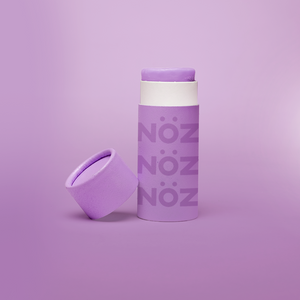 Lavender Nöz sunscreen stick product with cap off