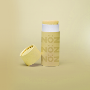 Yellow Nöz sunscreen stick product with cap off